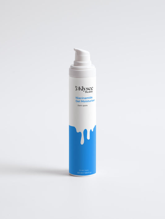 Skincare bottle with blue and white design on a light gray background