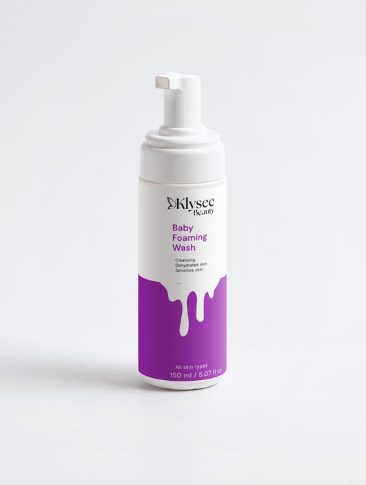 Klysee Baby Foaming Wash bottle with white pump and purple label on a light gray background