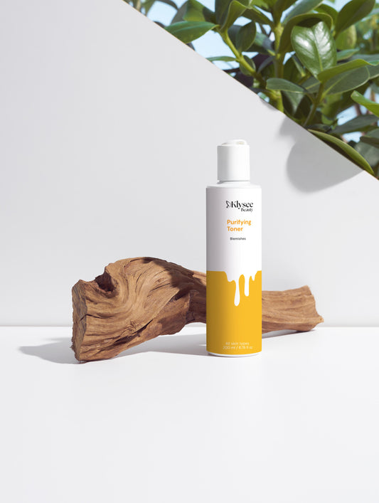 A close-up of clear, refined skin texture, illustrating the pore-clearing benefits of the Salicylic Acid toner.