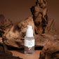 Skincare bottle with a white cap on a brown background with natural wood elements