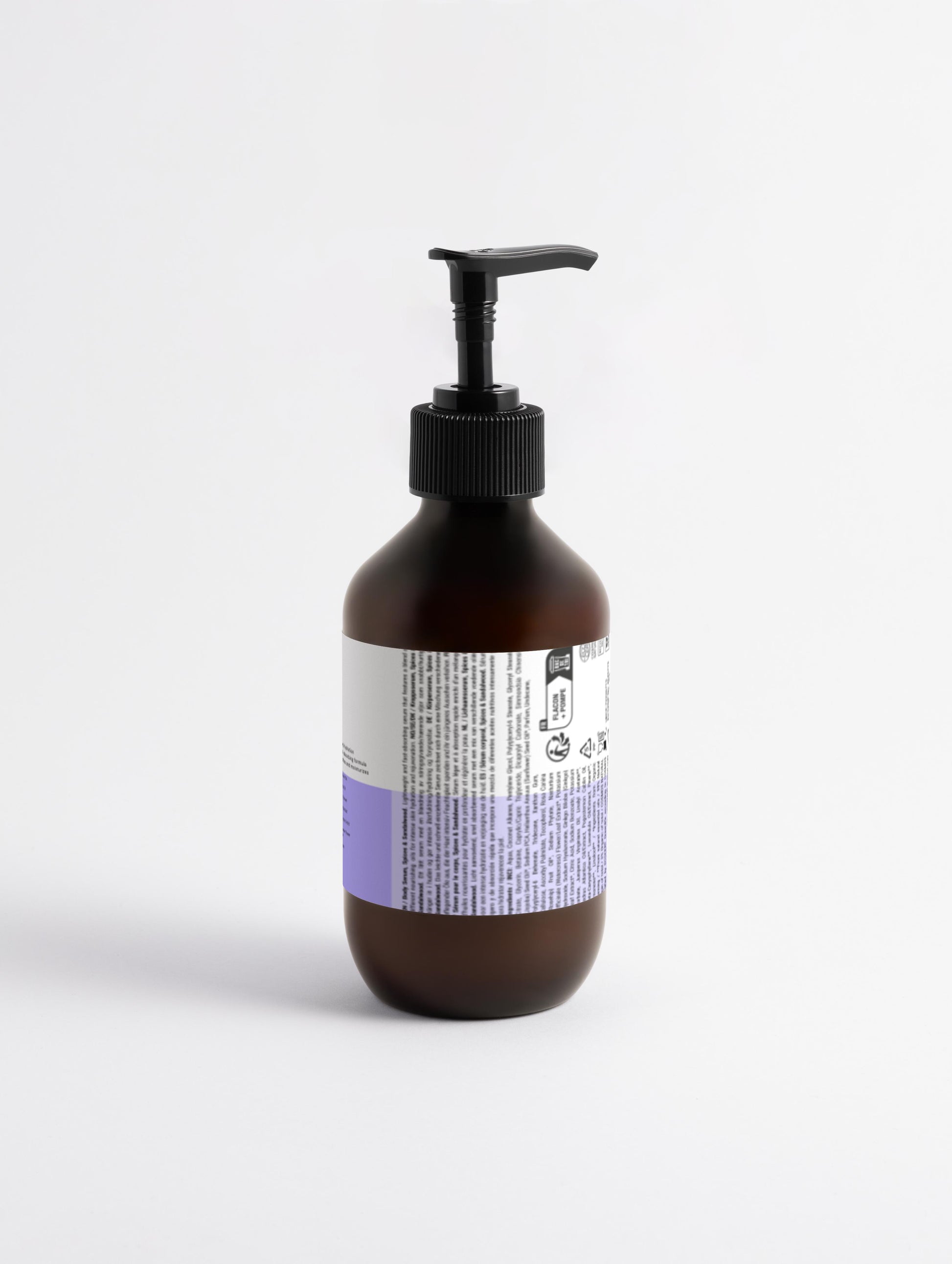 A close-up of the clear, lightweight serum texture being applied to the skin, illustrating its non-greasy and instant absorption.