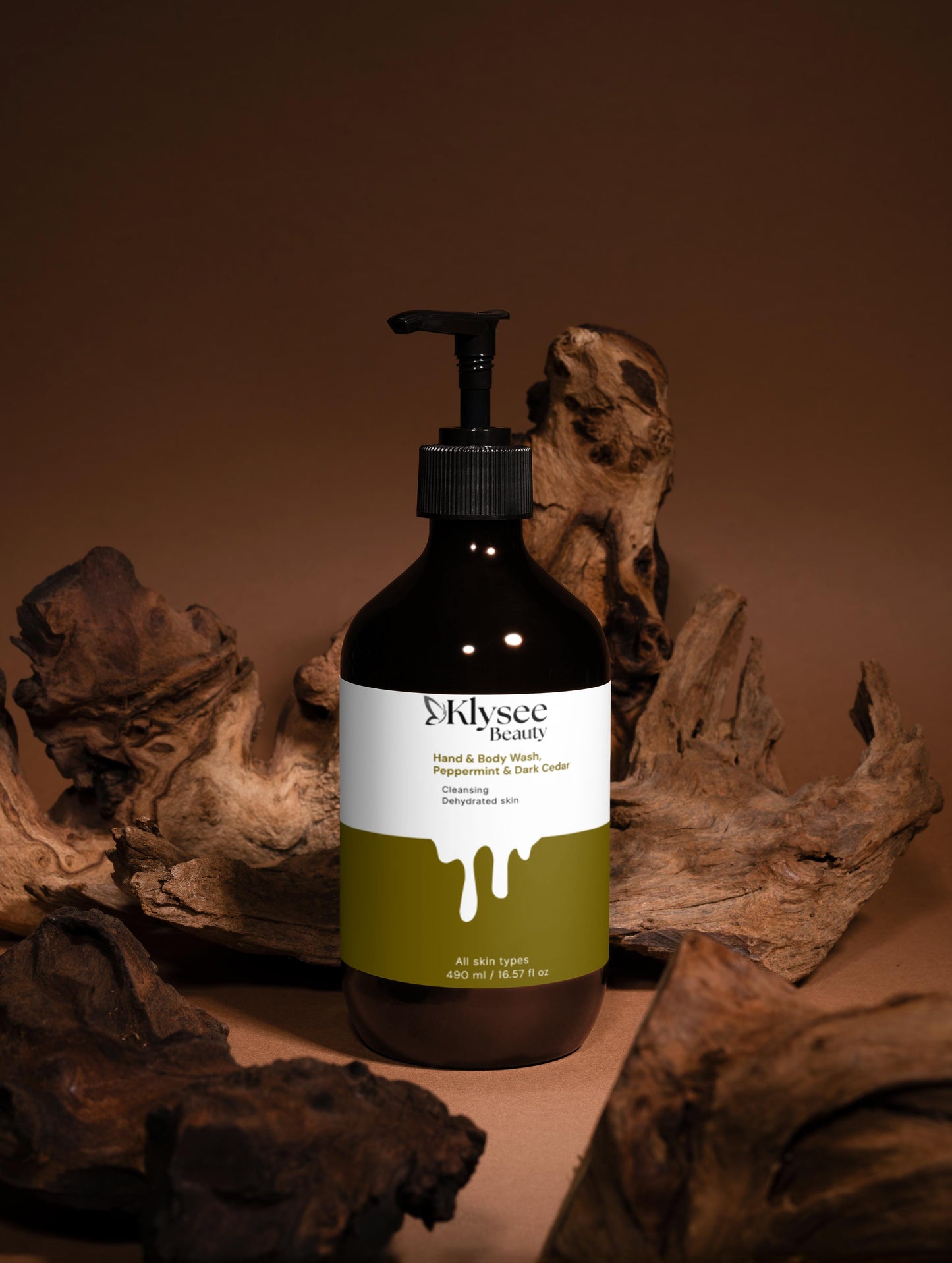 Bottle of Klyee Organic product with a brown background