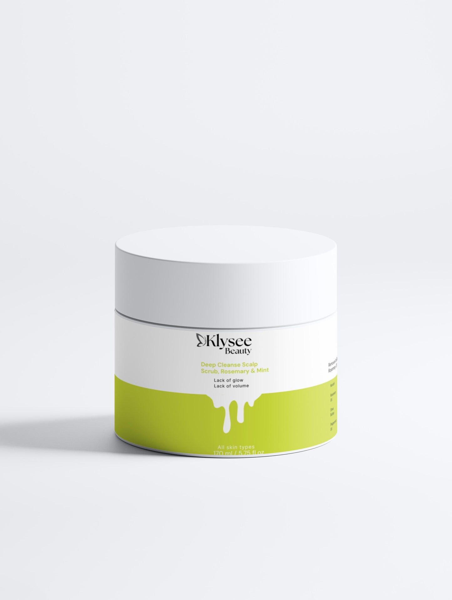 Klysee beauty product jar with white lid and green base on a white background