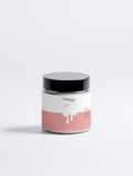 Klysee product jar with pink label on a white background