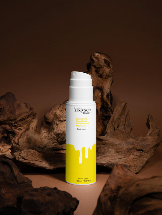 klysee skincare bottle with yellow label on a brown background