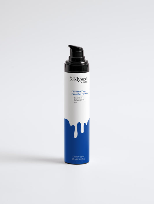 A man applying the fast-absorbing Klysee Zinc Face Gel to his cheek for instant skin hydration.