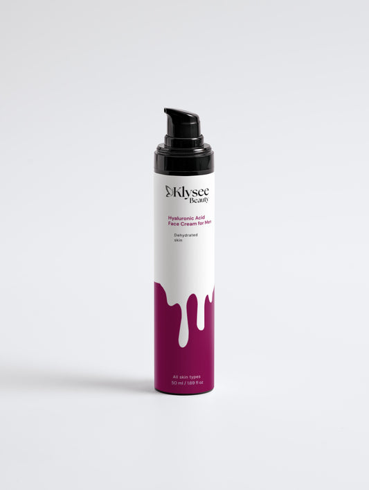 Skincare bottle with white label and black pump on a light gray background