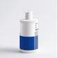 White and blue bottle on a light gray background