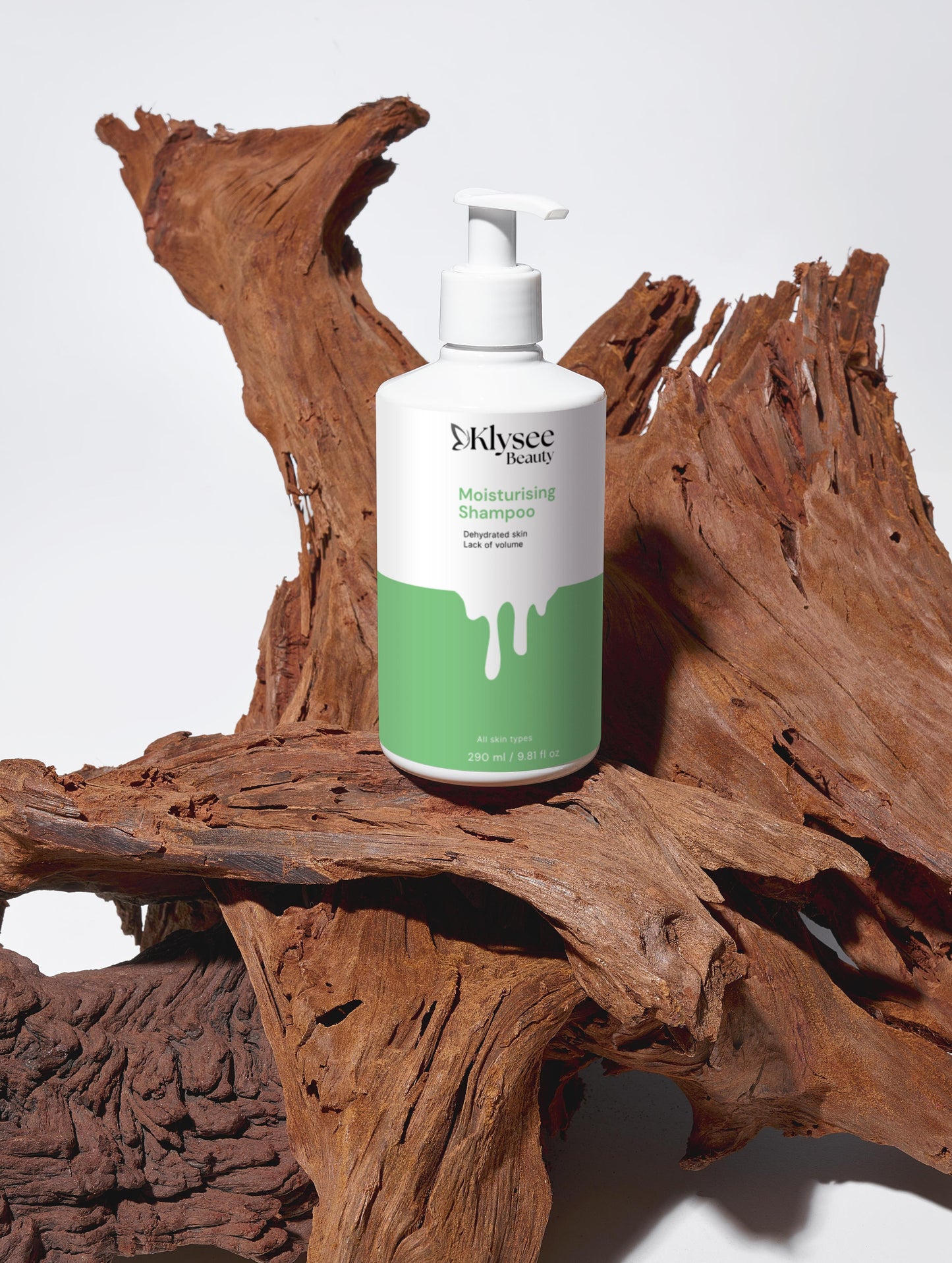 Klysee shampoo bottle on a wooden surface