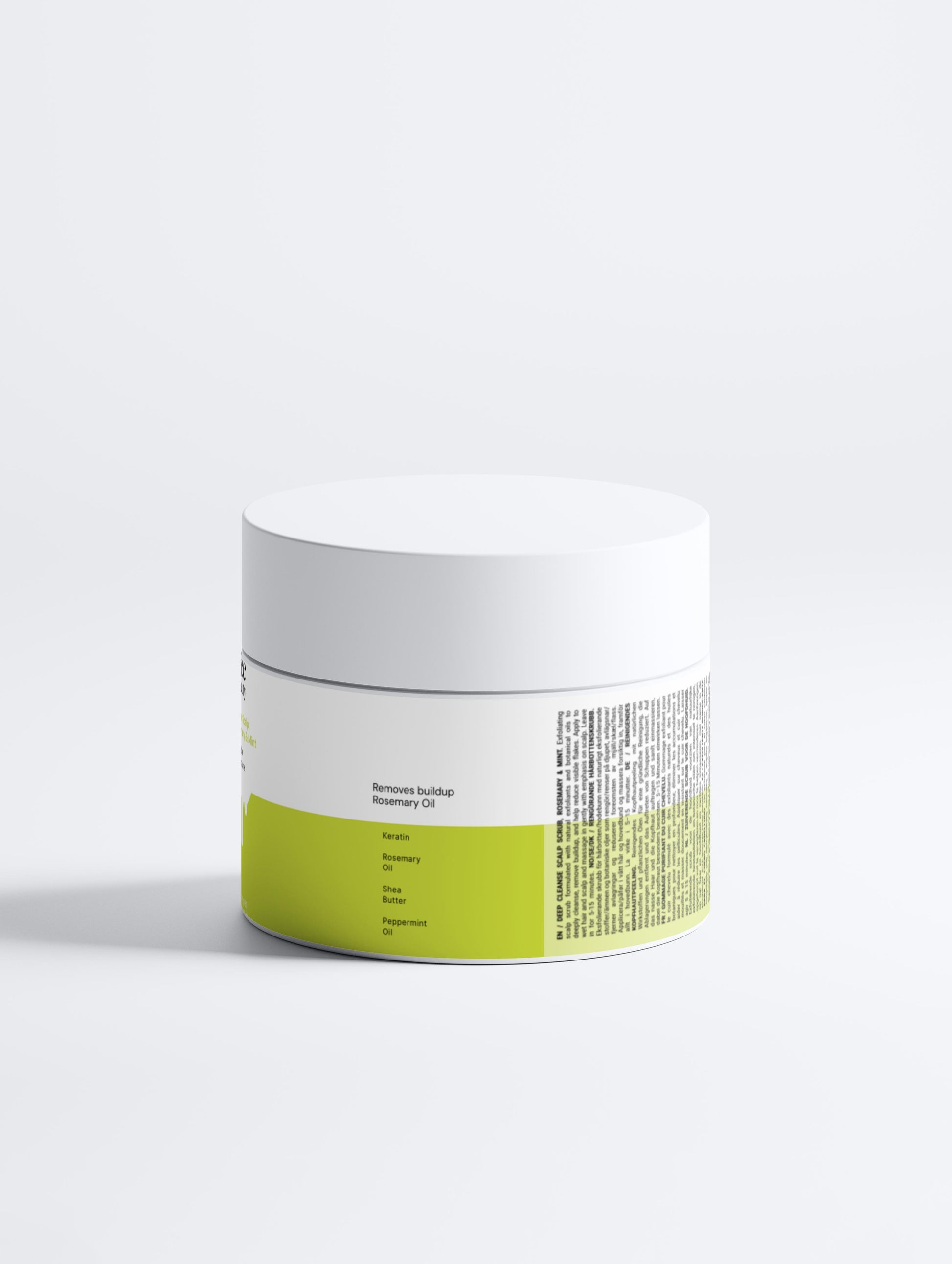 White and green jar with a label on a white background